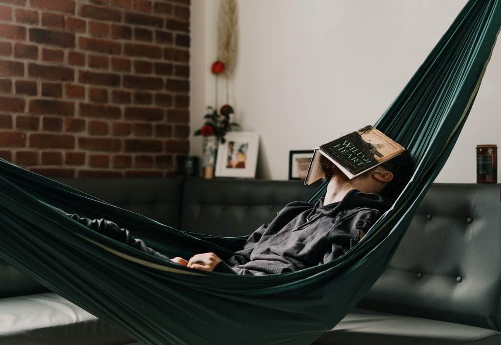Relaxing In A Hammock And Using And Protecting It With Hammock Cover