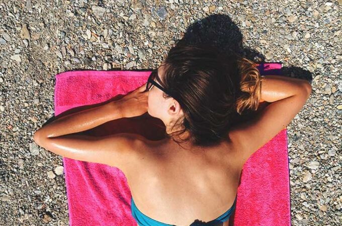Get a Tan but Avoid Getting Wet With A Beach Towel