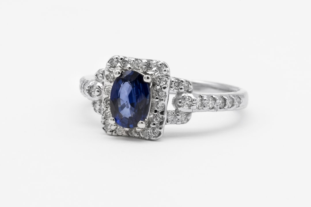 Oval blue sapphire and diamond white gold ring — choosing a 10th anniversary gift