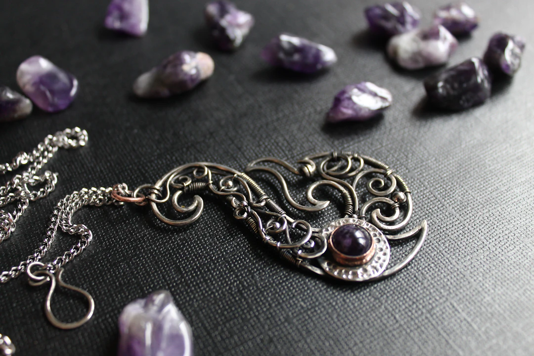 Silver necklace with amethyst stones — the February birthstone for Aquarius women