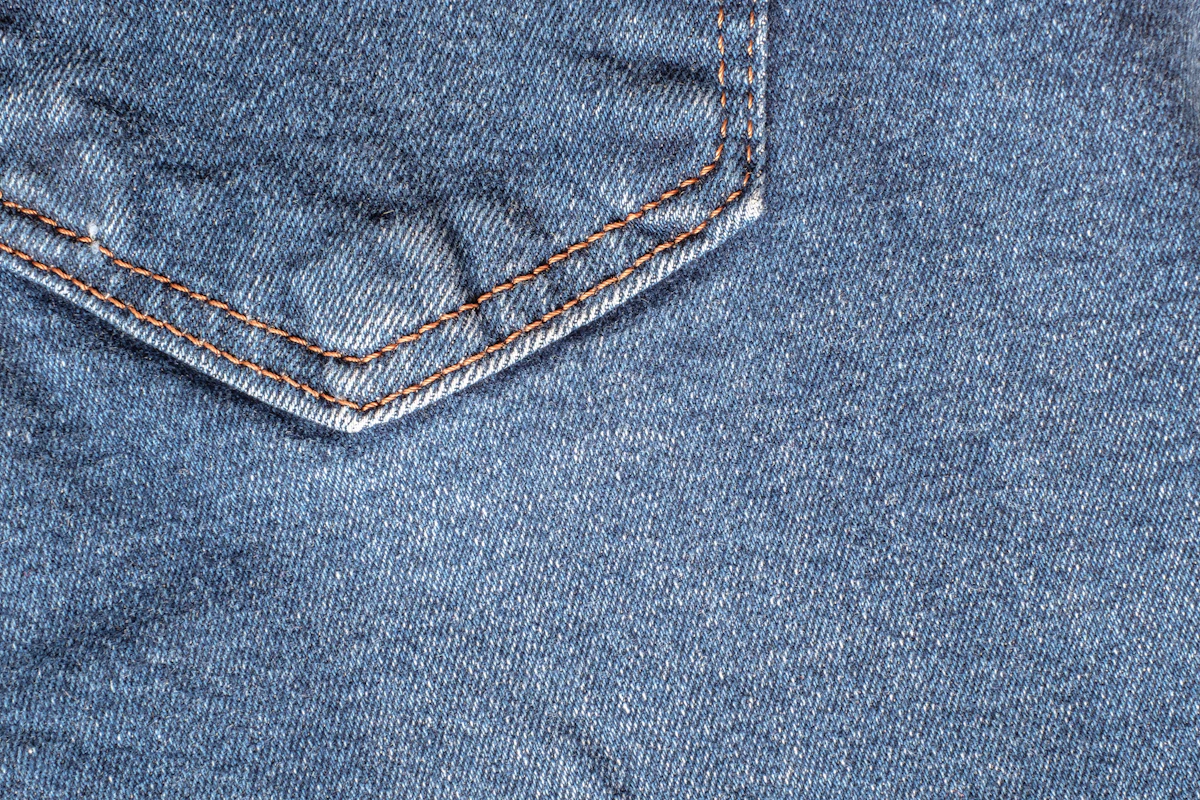 Close-up of jeans seams and pockets showing fit and detail