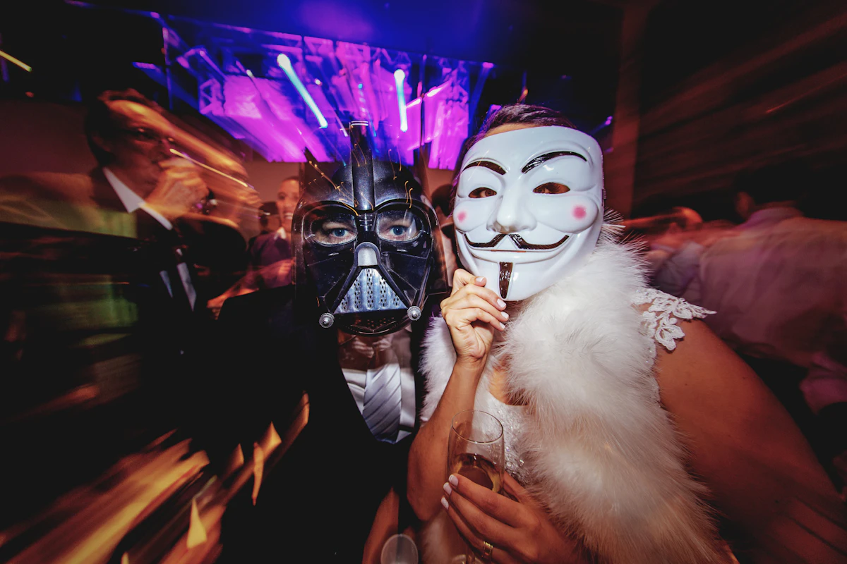 Couple wearing matching masks for a Halloween costume