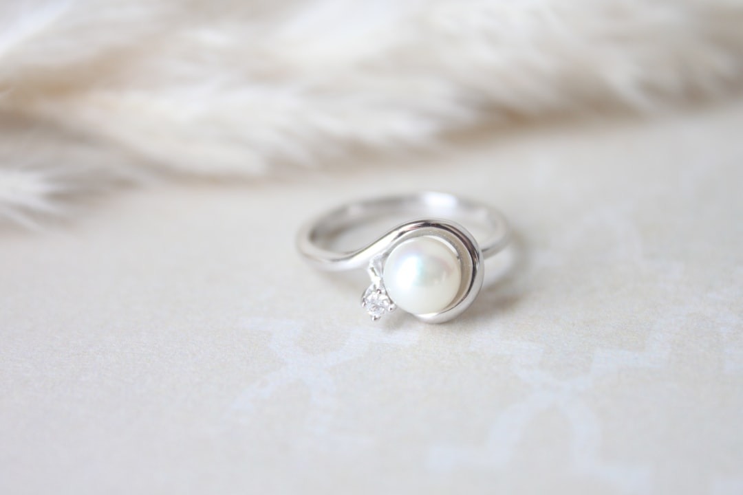 Elegant pearl ring close up, a classic love jewelry choice for Cancer