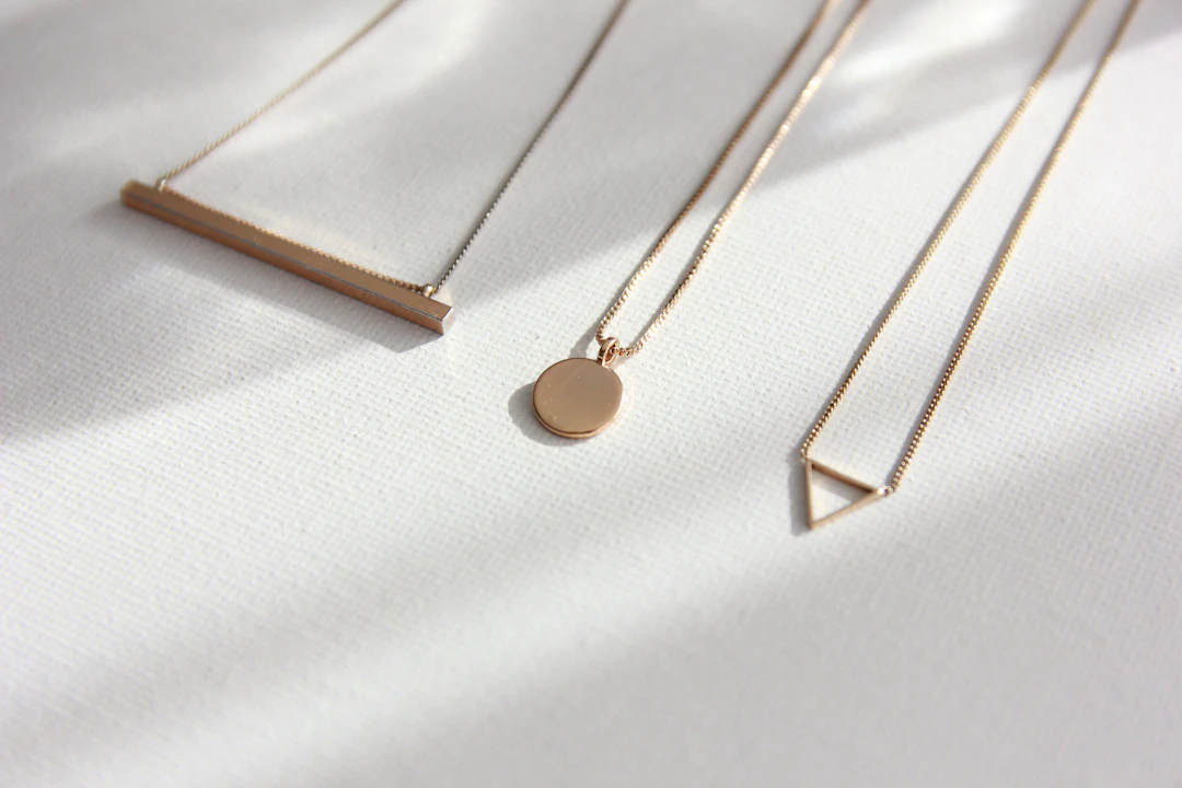 Clean geometric gold necklace — minimalist jewelry suited to Virgo women