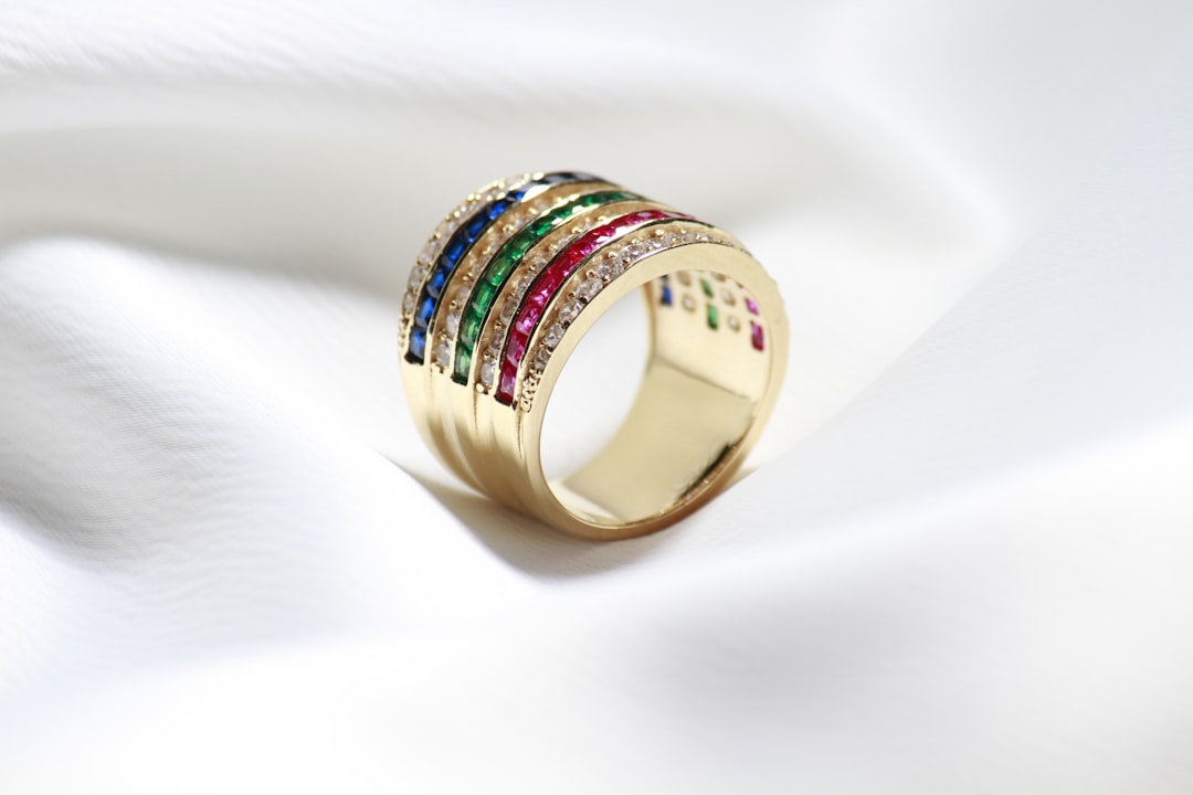 18k gold ring set with precious gemstones — anniversary jewelry by year