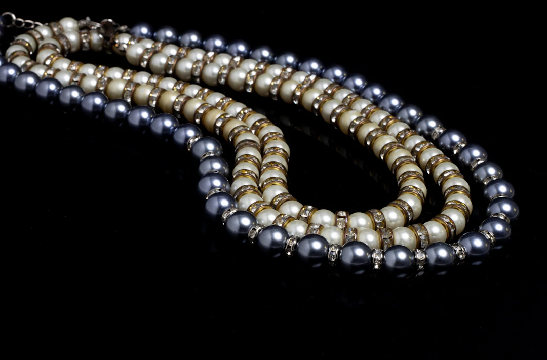 Grey and ivory pearls close up — luminous lunar tones for Cancer women