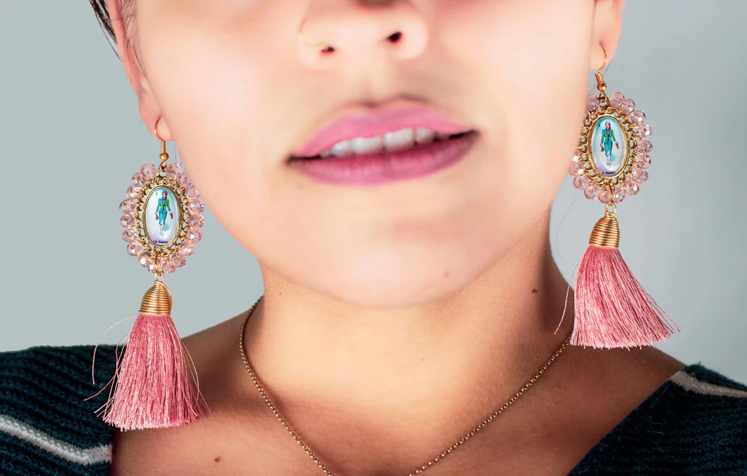 Woman wearing silver necklace and earrings — modern statement jewelry gifts for Aquarius women