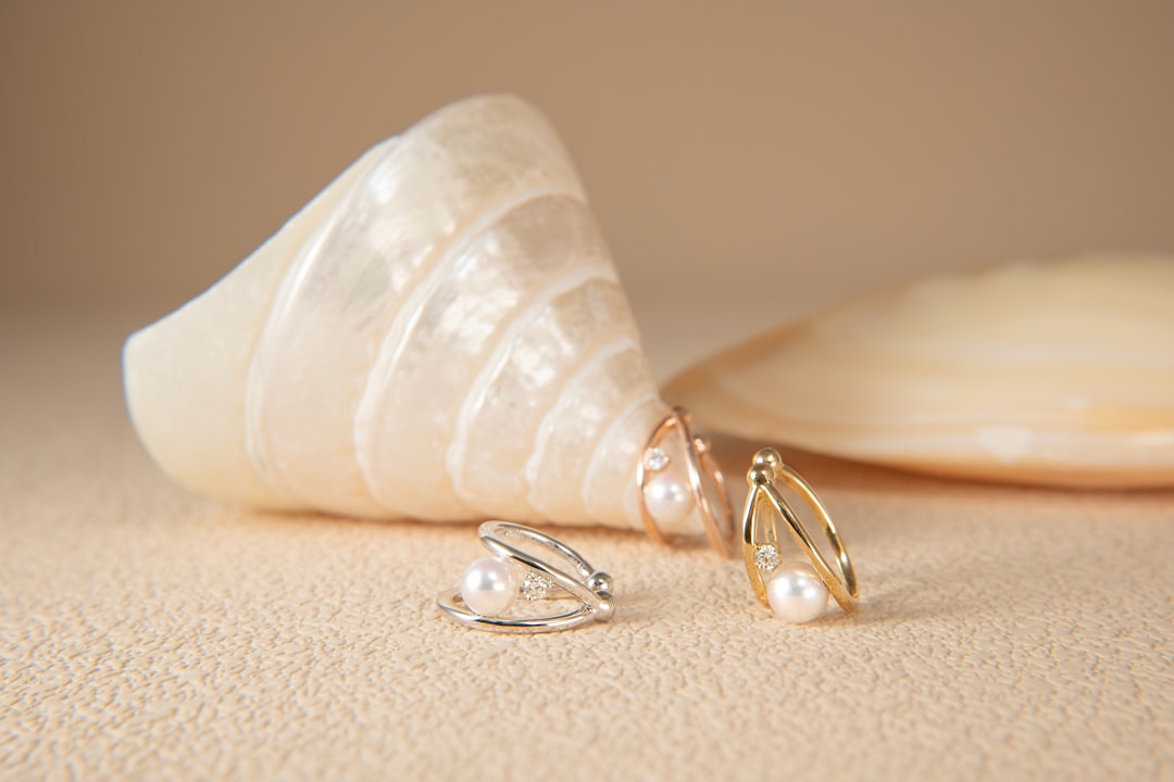 Gold and pearl ear cuff with diamonds — luxury jewelry gifts for women under $500