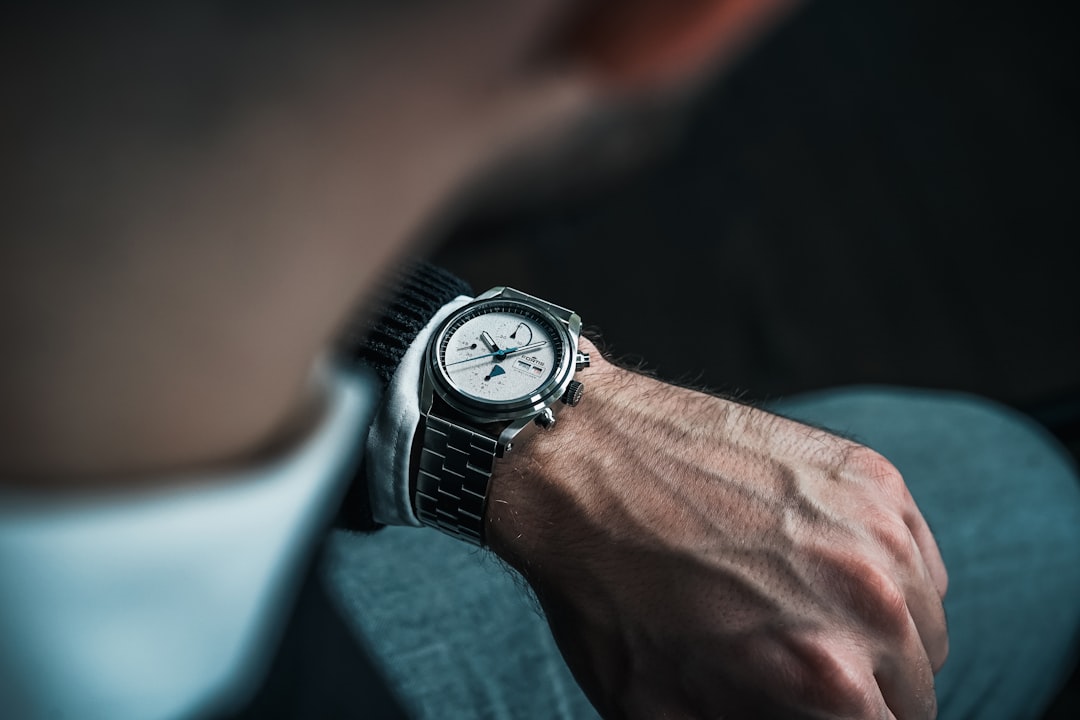 Close up of a luxury automatic watch on a man's wrist — a classic wedding gift for husbands