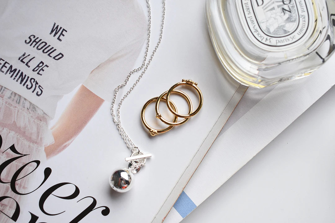 Silver and gold bracelets together — mixed metals suit the dual nature of Gemini women