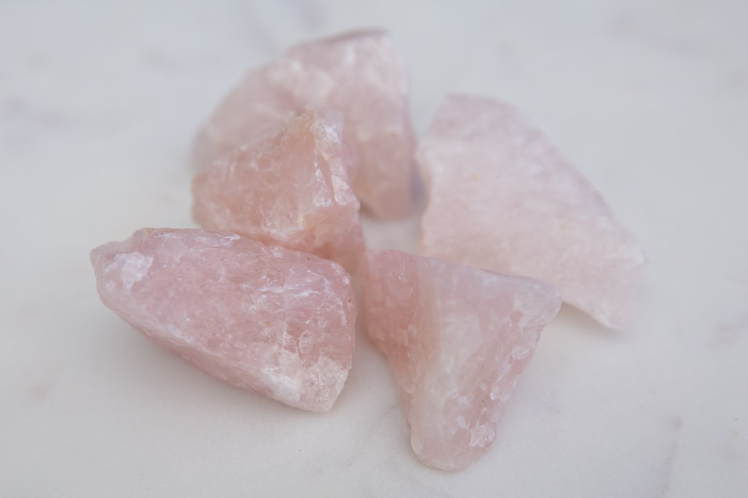Raw rose quartz, the classic love crystal for Venus-ruled Libra