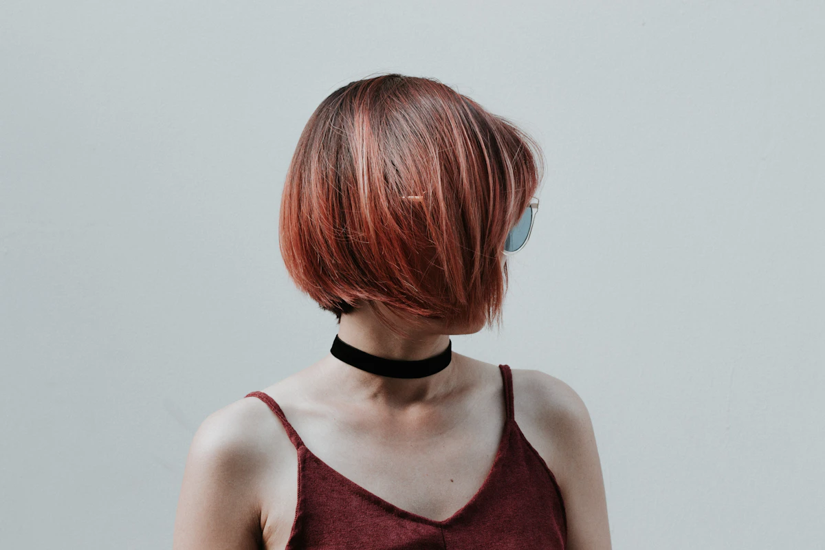 Portrait of a woman with a short haircut that suits her face shape