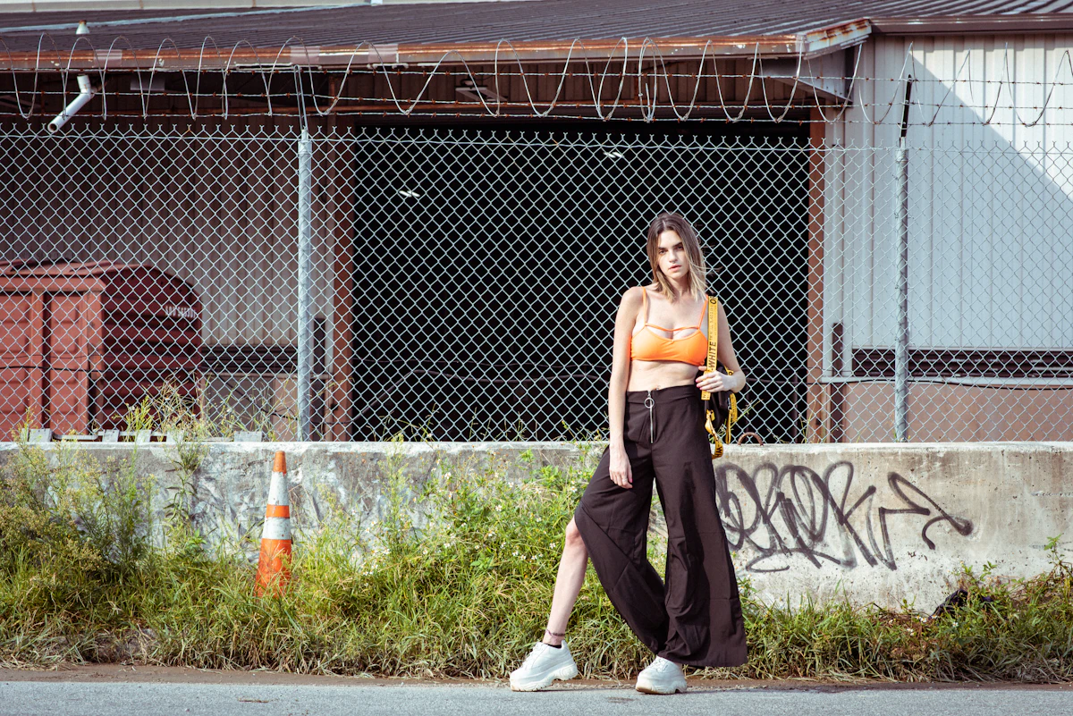 Woman showing how to style a brown jeans outfit