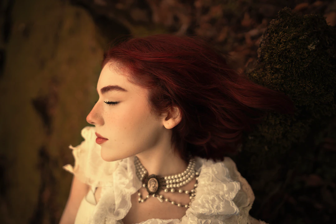 Young woman wearing a pearl necklace — soft romantic pearls suit Pisces women